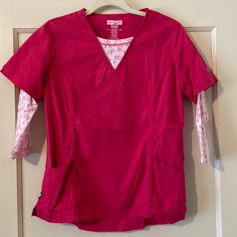 Scrub top. Never worn. Has stretch for comfort. Perfect for healthcare worker.